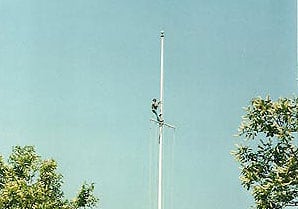 Person repairing flagpole